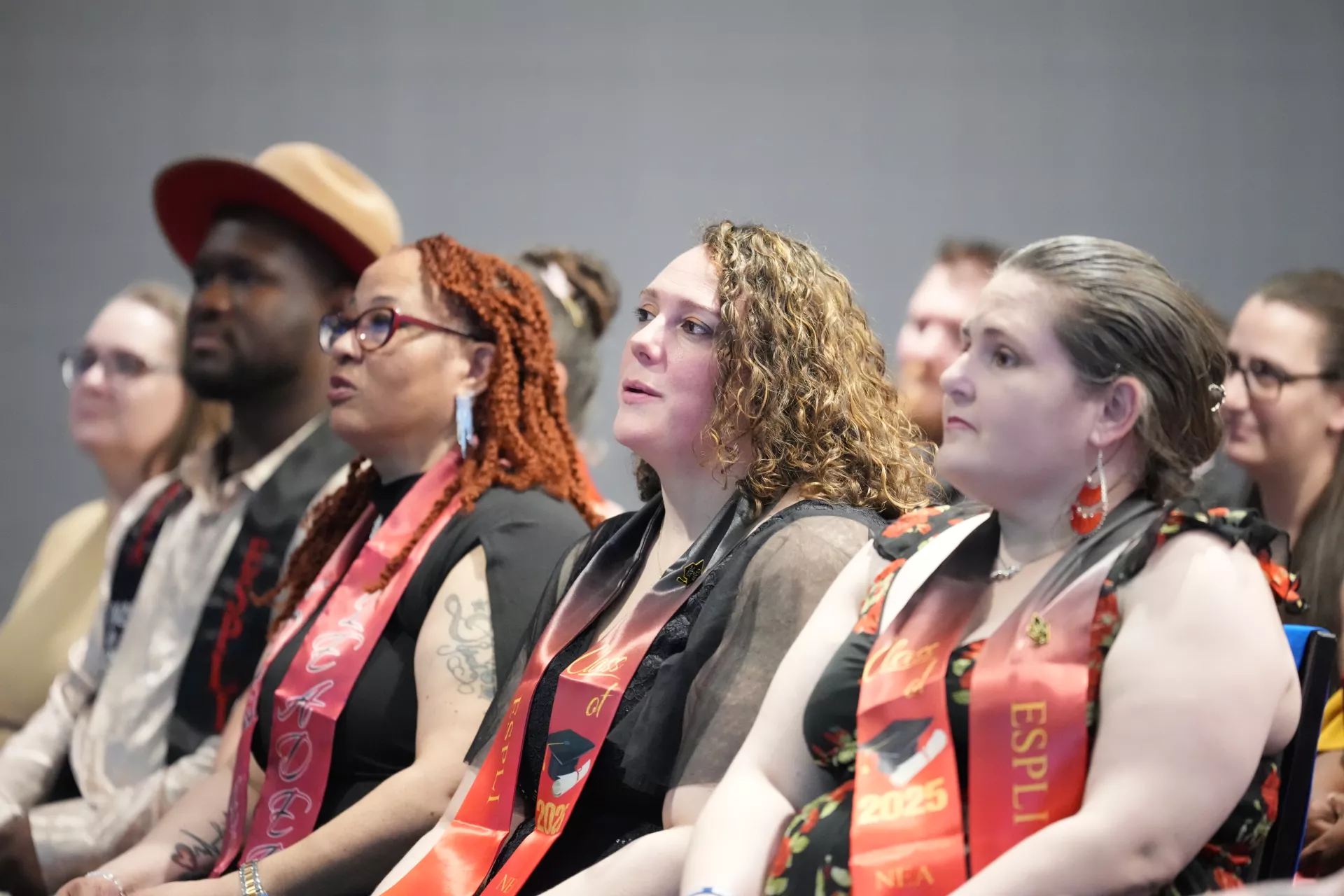 audience shot of a diverse group of members from the ESP Leadership Insitute sitting and listening to a speaker.