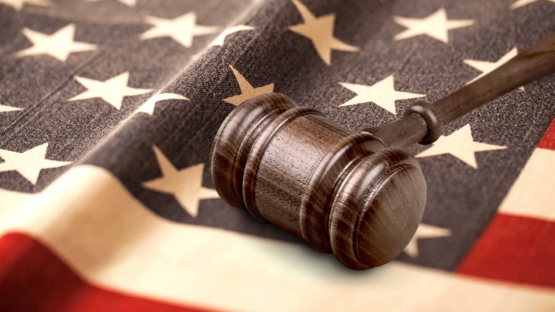 Gavel on top of the American flag.