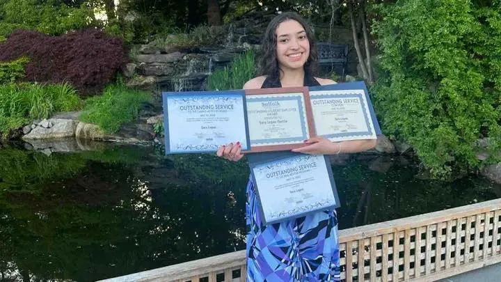 Sara Lopez Garcia with academic awards