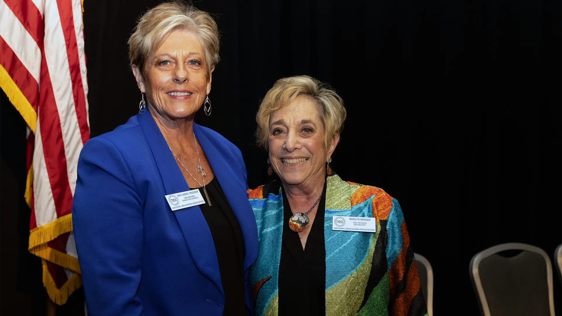 NEA-Retired President Anita Gibson and NEA-Retired Secretary Marilyn Warner stand and pose together at the 2025 NEA Retired Annual Meeting