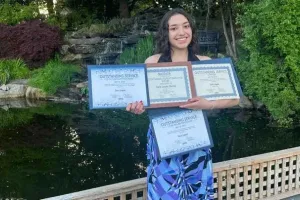 Sara Lopez Garcia with academic awards