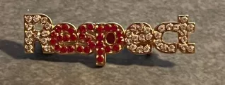 Gold and red Respect pin