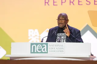 Education International President Mugwena Maluleke addresses RA Delegates from the stage