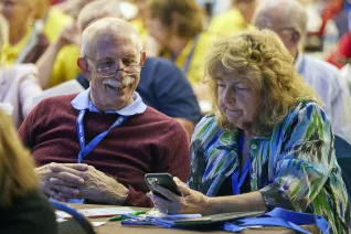 close up of a male and female attendee at the NEA Retired annual conference
