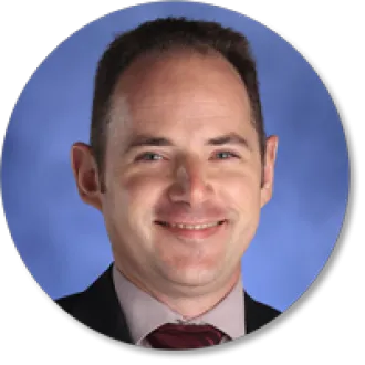 Lem Wheeles, government teacher, in Alaska.