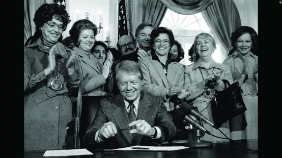 President Carter signs Anti-Discriminatory Law