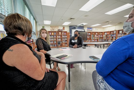 NEA President Becky Pringle talks to teachers a Baltimore Highlands Elementary School