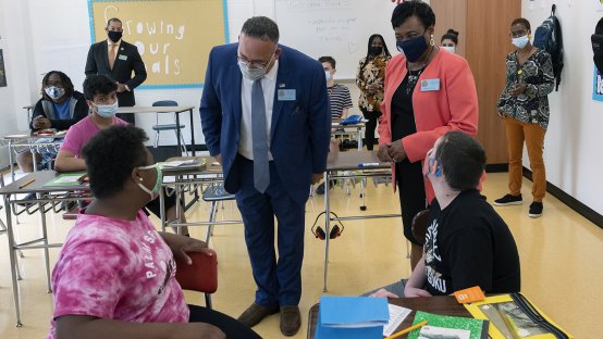 NEA President Becky Pringle and Education Secretary Miguel Cardona visit with students at a New Jersey High School