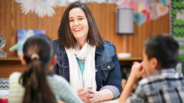 First grade teacher Leslie Richardson with her students