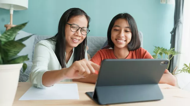 mother and daughter on virtual phone call