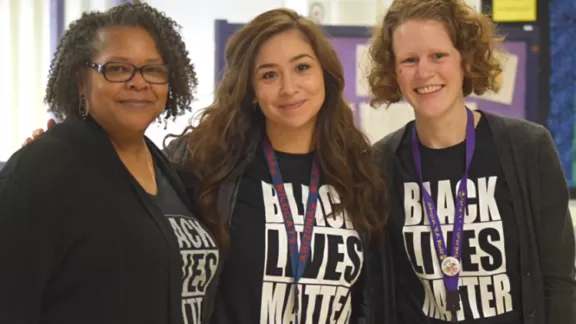 3 educators wearing Black Lives Matter shirts