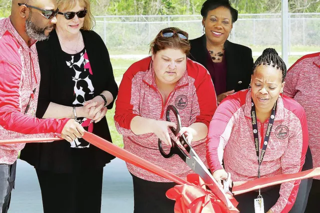 NEA President Becky Pringle attends the ribbon cutting ceremony for East Elementary's outdoor classroom