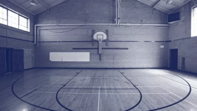 Empty indoor school basketball court