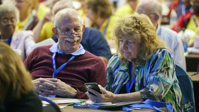close up of a male and female attendee at the NEA Retired annual conference