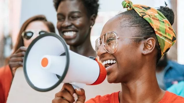 Black female with bullhorn