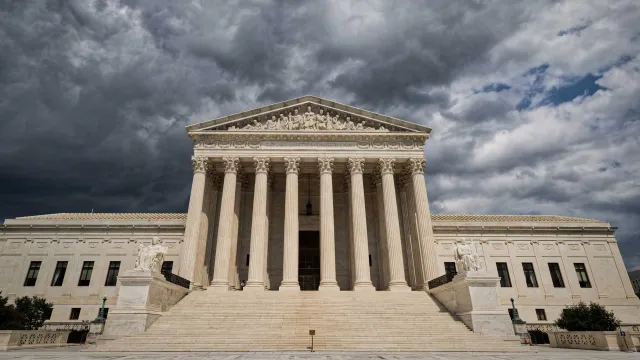 U.S. Supreme Court with ominous skies