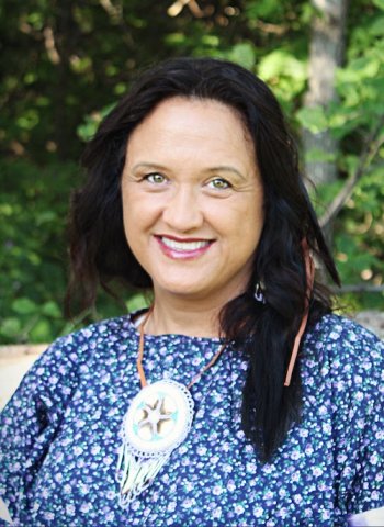 Headshot of educator Theresa Ziebarth-Moritz, wearing native necklace