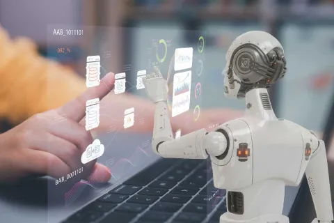 Image depicting student interacting with AI robot.