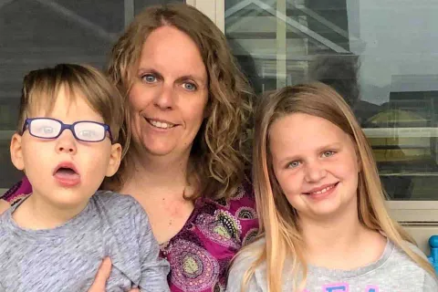 Iowa teacher Nancy Baker Curtis, and her two children, Charlie and Sophia.